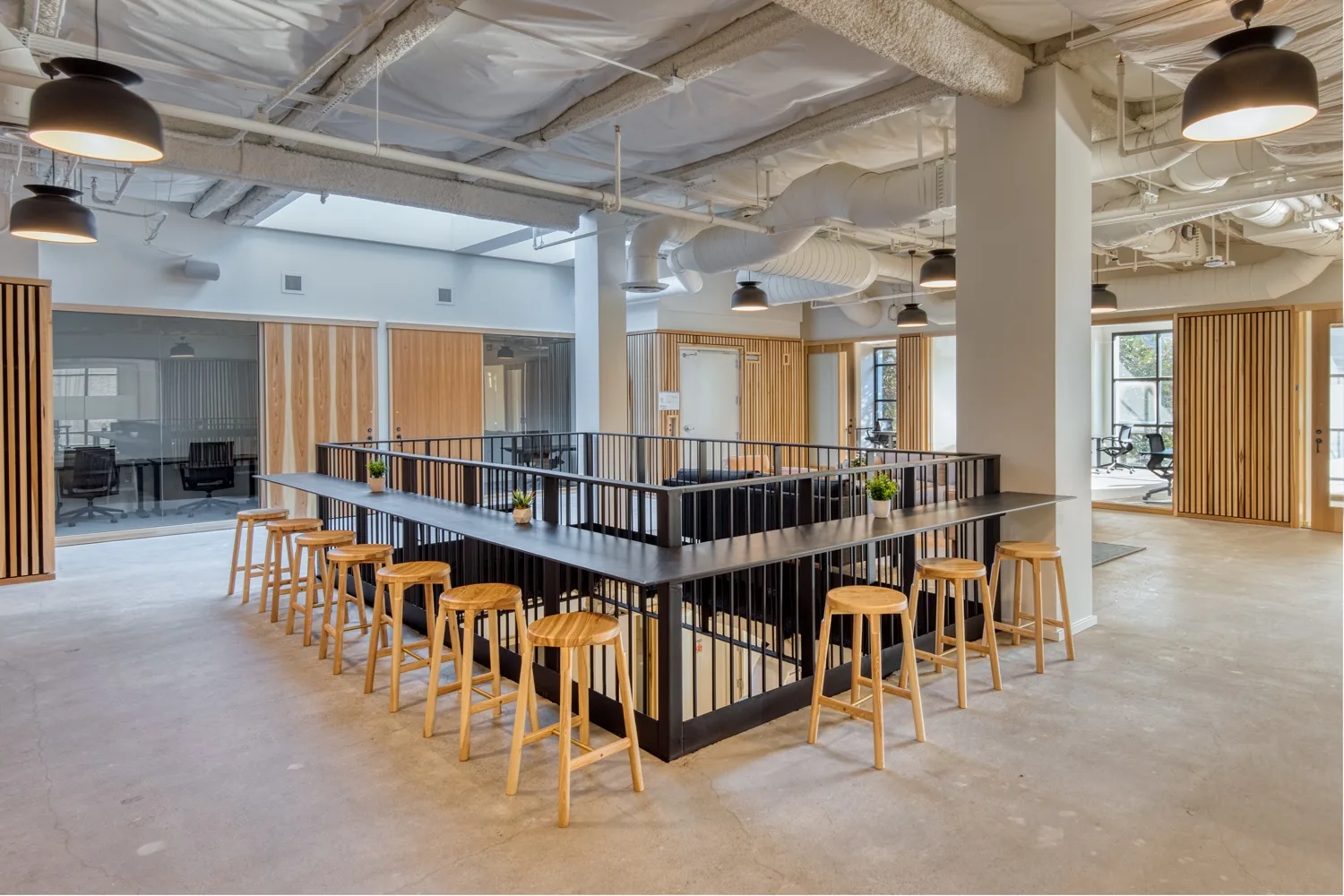 Shared tables in the commons at CENTRL Downtown Sacramento.
