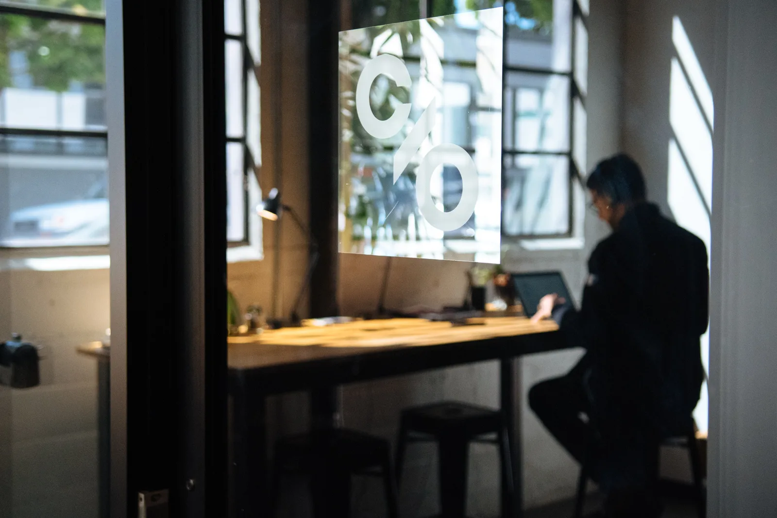 A member at work by the window at CENTRL Pearl District.