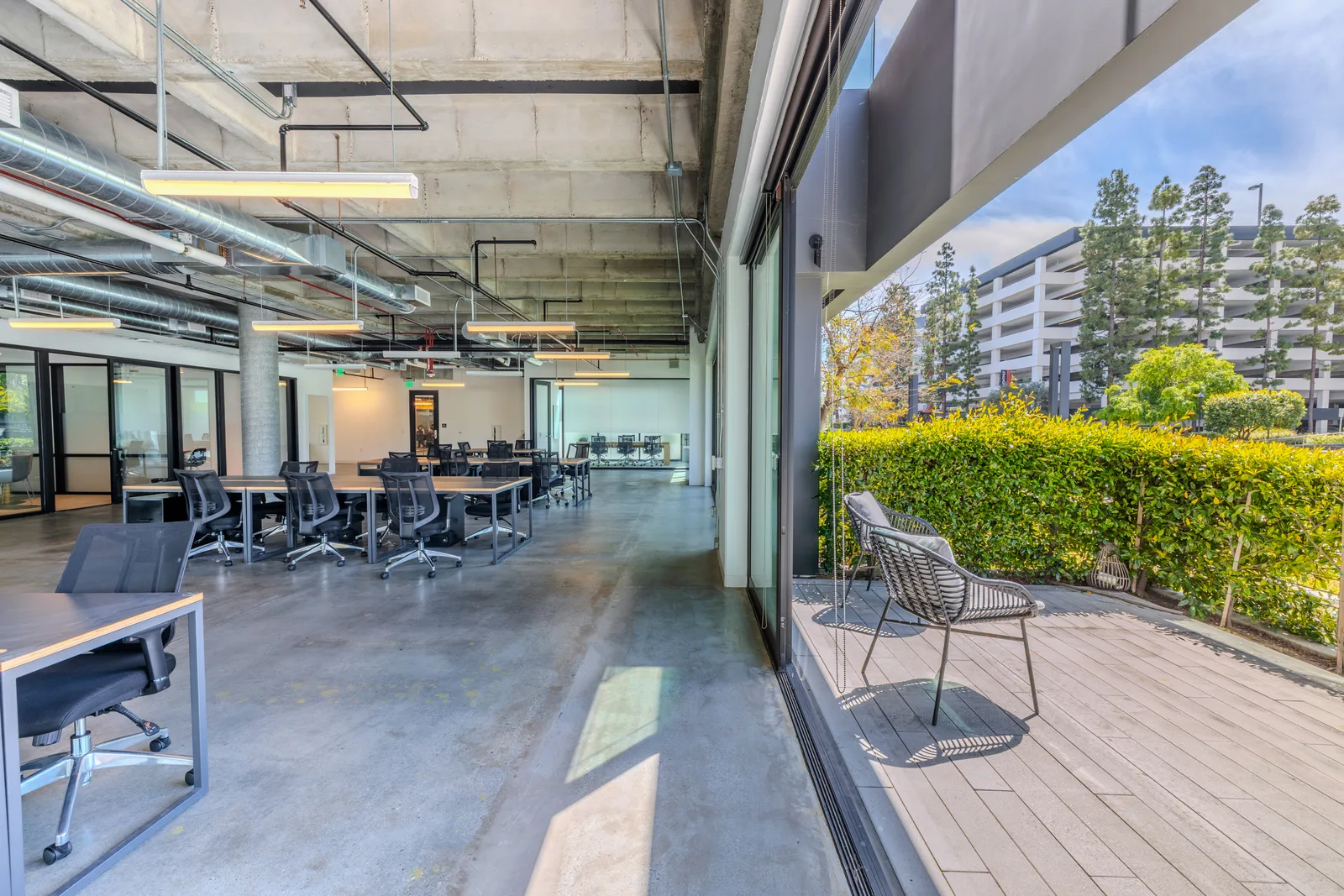 An office opening onto the patio at CENTRL South Bay.