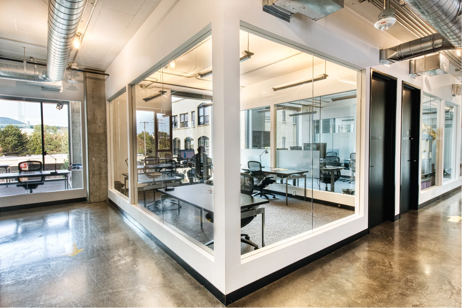 A glass-walled office at CENTRL Eastside