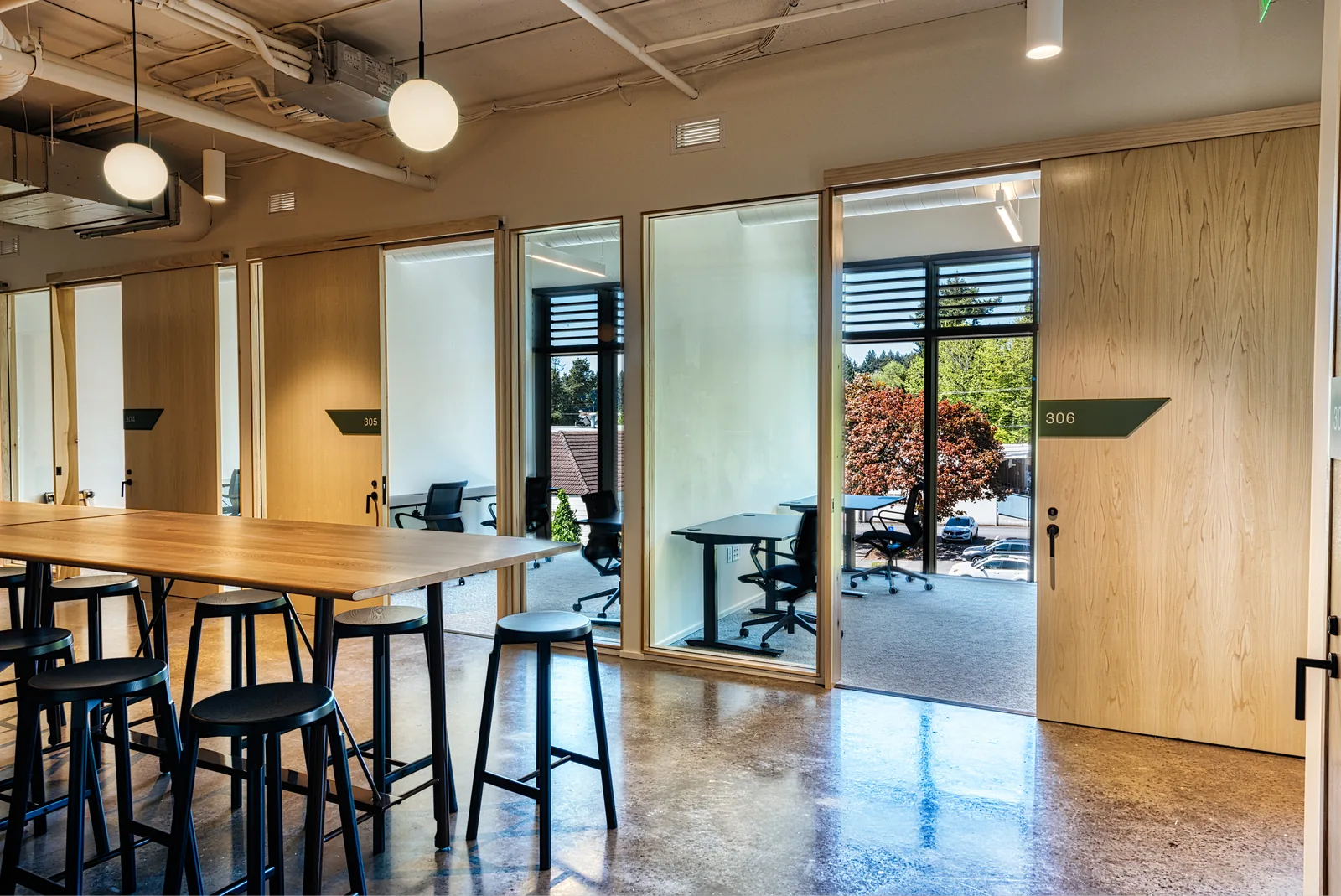 An office with high-top seating at CENTRL Lake Oswego