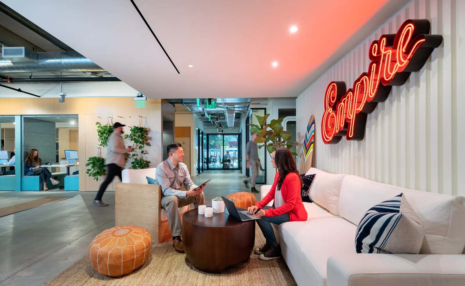 Members talking in a CENTRL Office lounge